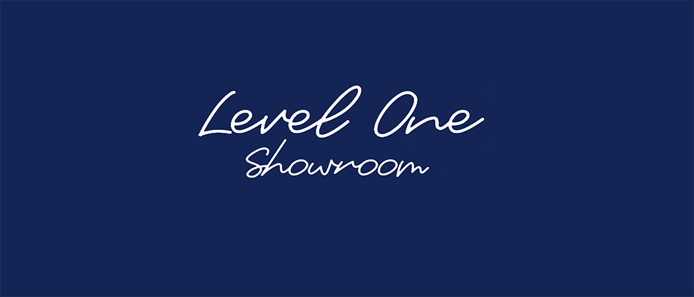 White handwritten text on a dark blue background reads "Level One Showroom". Level One Showroom - Luxury Fashion Distributor UK