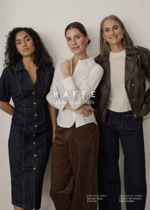KAFFE Autumn Winter 2026 womenswear collection featuring a dark denim dress, white blouse with brown corduroy trousers, and brown leather jacket styled with wide-leg jeans.