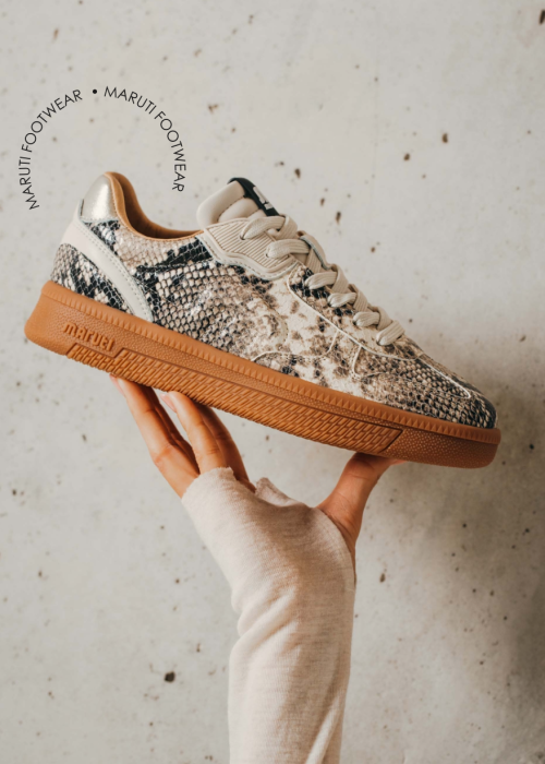 Maruti Footwear snake-print sneaker with cream laces, metallic heel detail and gum rubber sole.