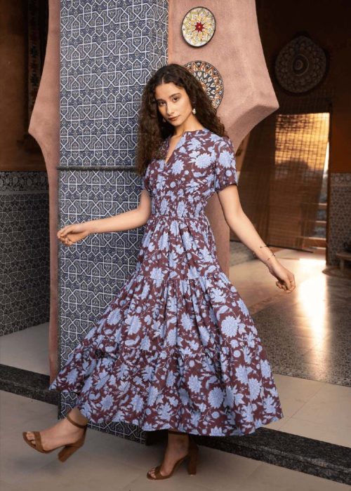 Echo of Pink floral maxi dress in burgundy and light blue with short sleeves, a fitted shirred waist and tiered skirt.