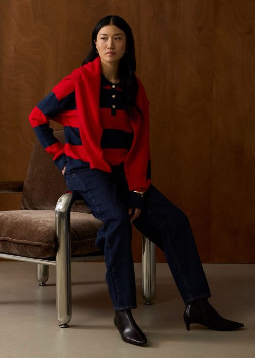 Garcia red and navy striped knit sweater styled with dark wash jeans and black ankle boots.